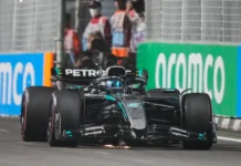 George Russell wins F1’s Singapore GP as McLaren secures constructors’ title