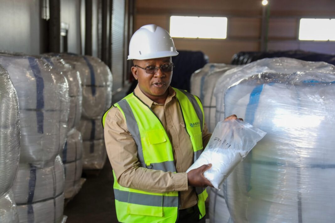 Minister Kambamura is holding Africa's FIRST battery-grade lithium sulphate (≥99.5% purity)!