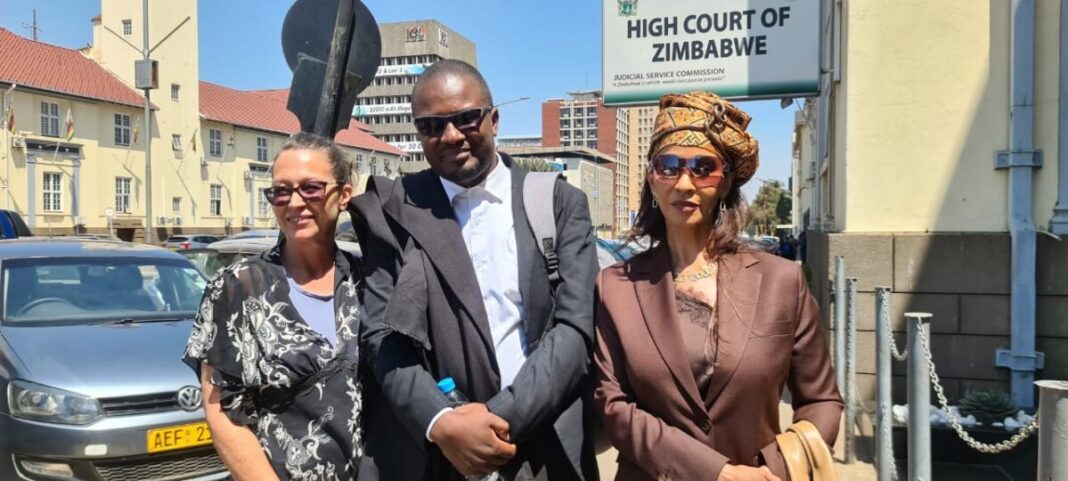 Tracey Moolman (left), lawyer Lincoln Majogo (middle) and Karen Mutasa outside the Harare High Court
